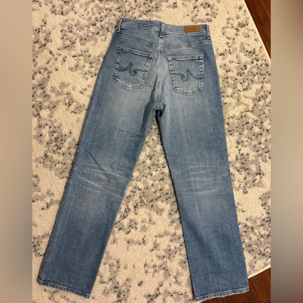AG jeans- never worn. “Brinley” mid rise straight denim
